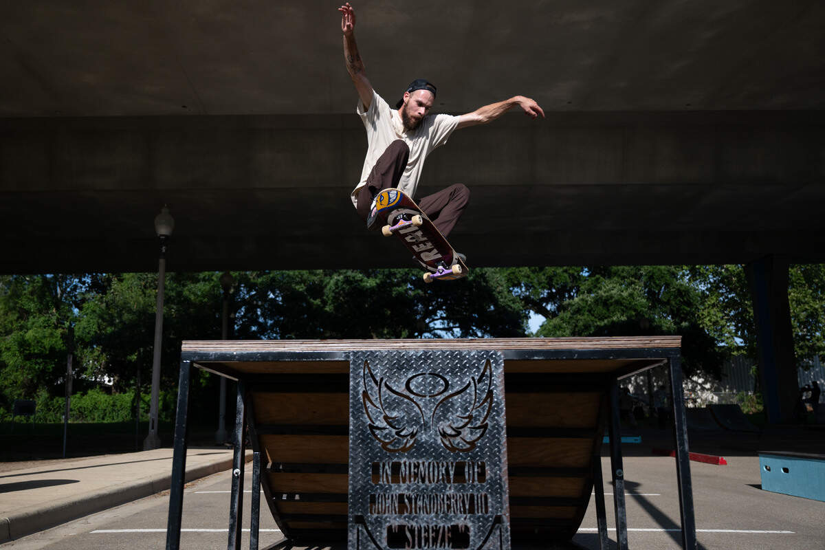 Andrew Buras performs a trick on a quarter-pipe July 8 at the Biloxi DIY Skatepark.