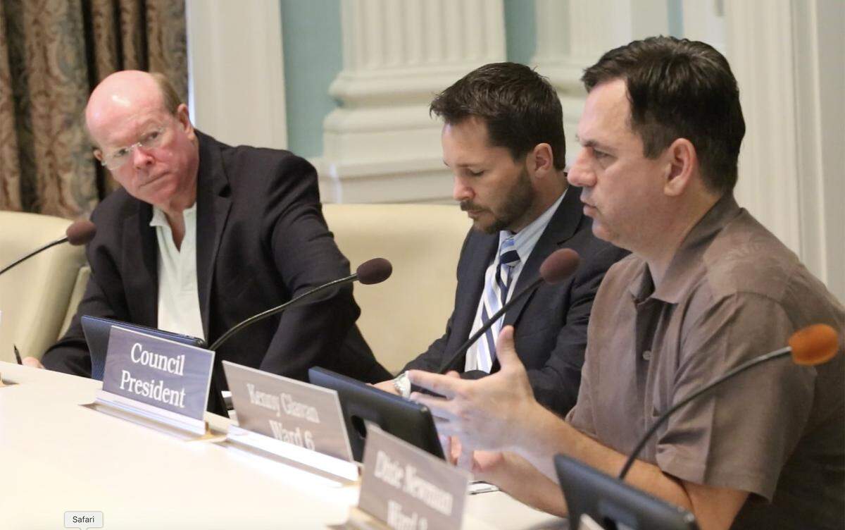 Biloxi Council member Kenny Glavan, right, speaks at a special council meeting in July 2018 about short-term rentals in the city.