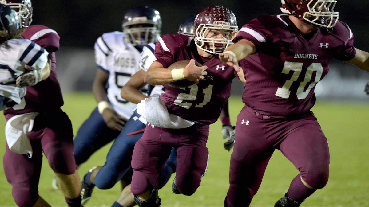 GLENN ANDREWS/SPECIAL TO THE SUN HERALDEast Central running back A.J. Davis has been a workhorse for the Hornets this season. The 5-foot-10 senior has already racked up 1,546 yards to lead the Coast.