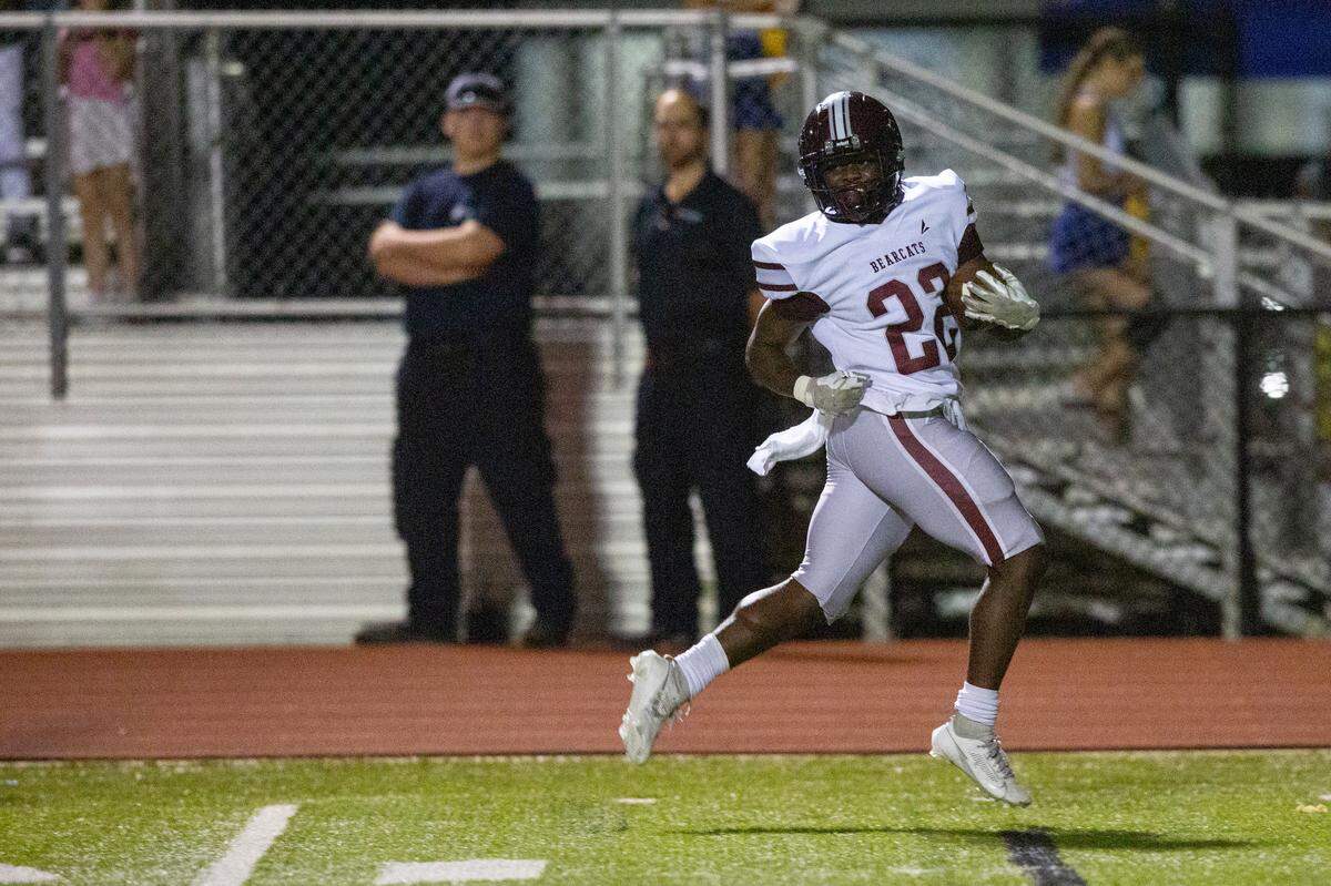 Long Beach’s Junior Brown runs the ball in for a touchdown during a game between Bay High and Long Beach at Tiger Stadium in Bay St. Louis on Friday, Sept. 13, 2024.