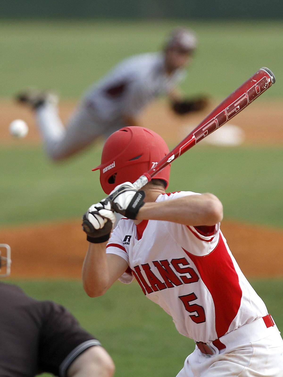 TIM ISBELL/SUN HERALD  Biloxi's Trey Shaffer watches the pitch of Long Beach hurler Josh Borzik during Futures All Star game.