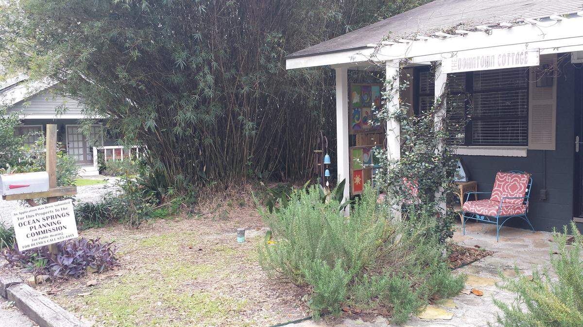 KAREN NELSON 
 The Downtown Cottage near City Hall in Ocean Springs has a sign posted outside, on the left, as part of the process for becoming a short-term rental. The sign alerts neighbors that the business has applied for a permit.