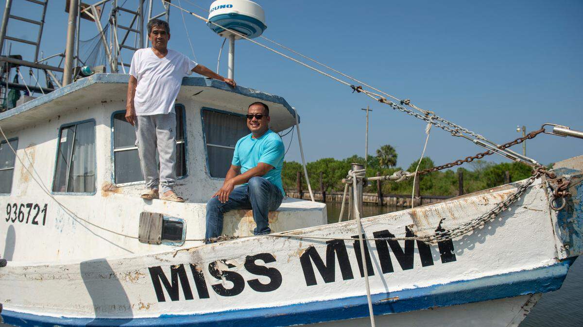Elvis Ta and his father Sau Truong on Truong’s shrimping boat, Miss Mimi, at Bayou Caddy in Bay St. Louis on Thursday, June 29, 2023.