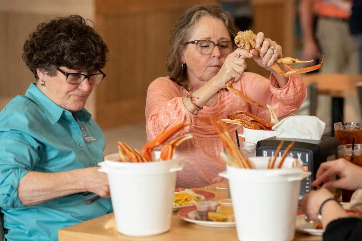 Customers dine on crab legs at Boomtown Casino’s new buffet, the Biloxi Bay Buffet, on Thursday, April 3, 2025.