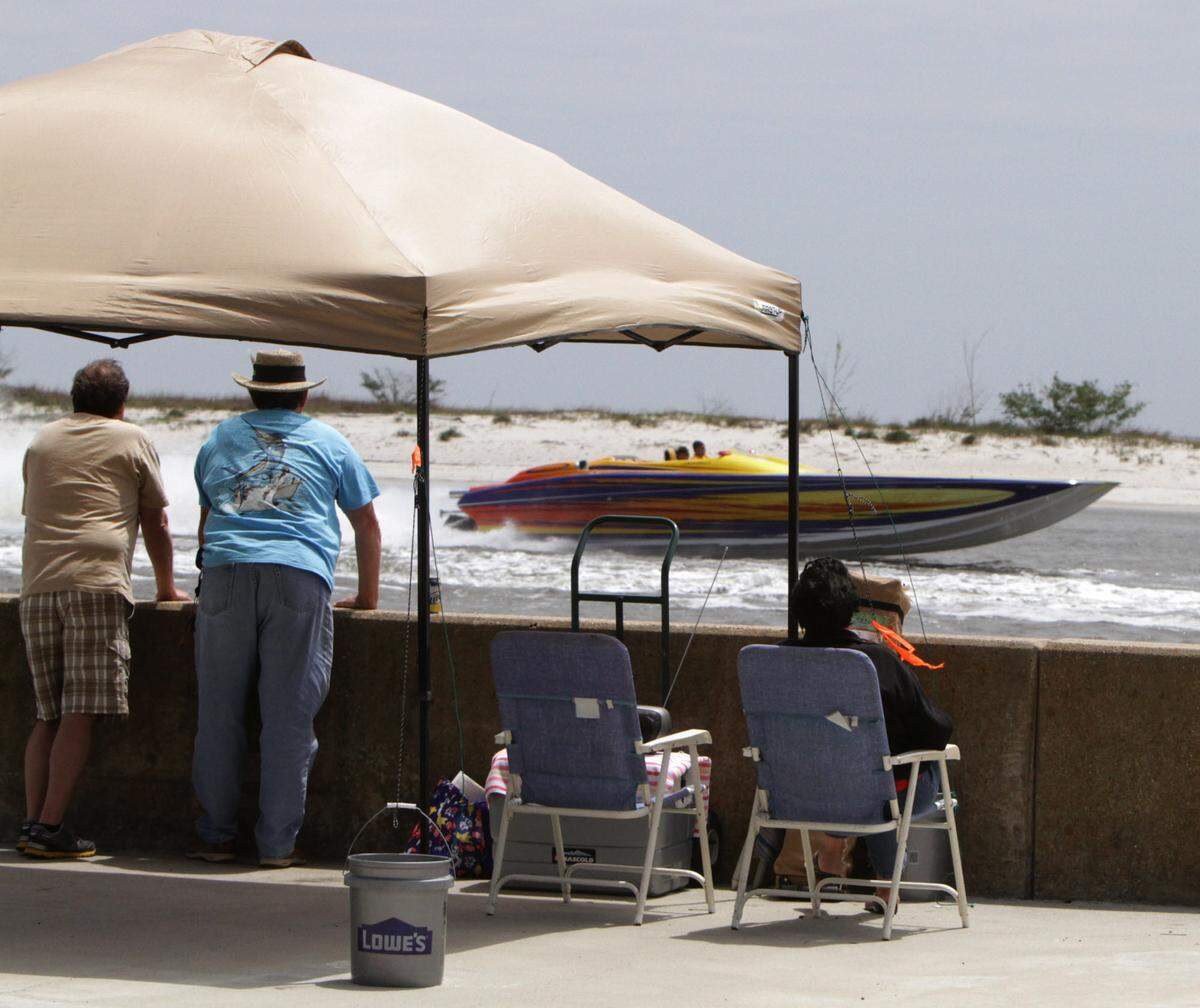 Spectators at the Biloxi Small Craft Harbor watch a boat pass during Smokin' the Sound in 2013. A new race is in the works for 2026.