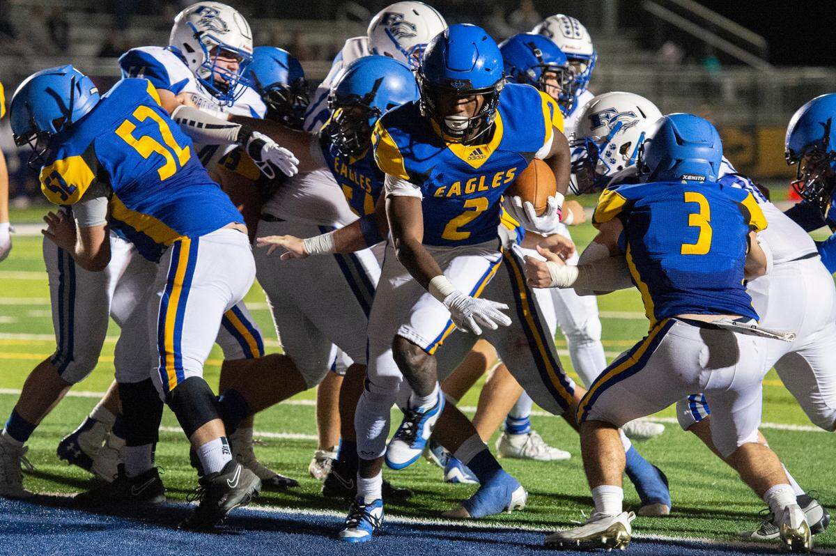 Resurrection’s Daniel Pickens runs the ball into the end zone for a touchdown during a game against French Camp Academy at Gautier High School in Gautier on Friday, Nov. 3, 2023.