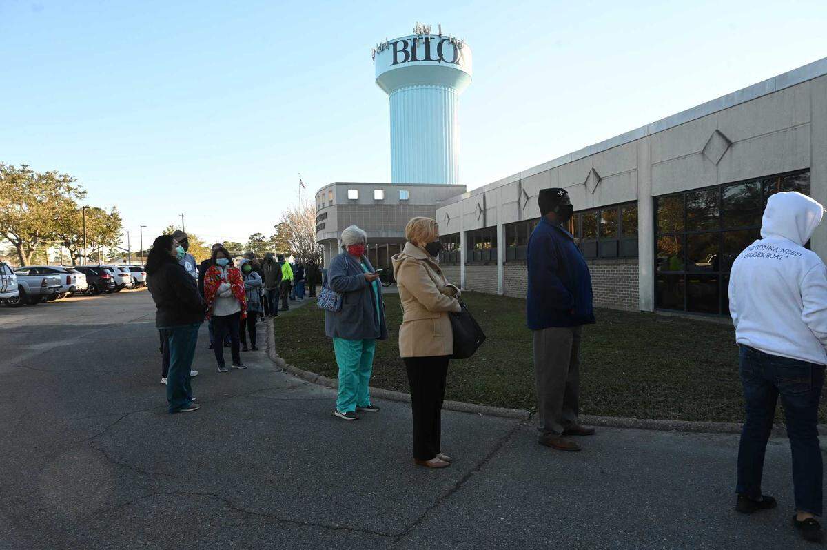 Voters line up at the Margaret Sherry Library in Biloxi to cast their votes on Nov. 3, 2020. On Tuesday, voters will cast their ballots for one of the five candidates in the Ward 4 special election.