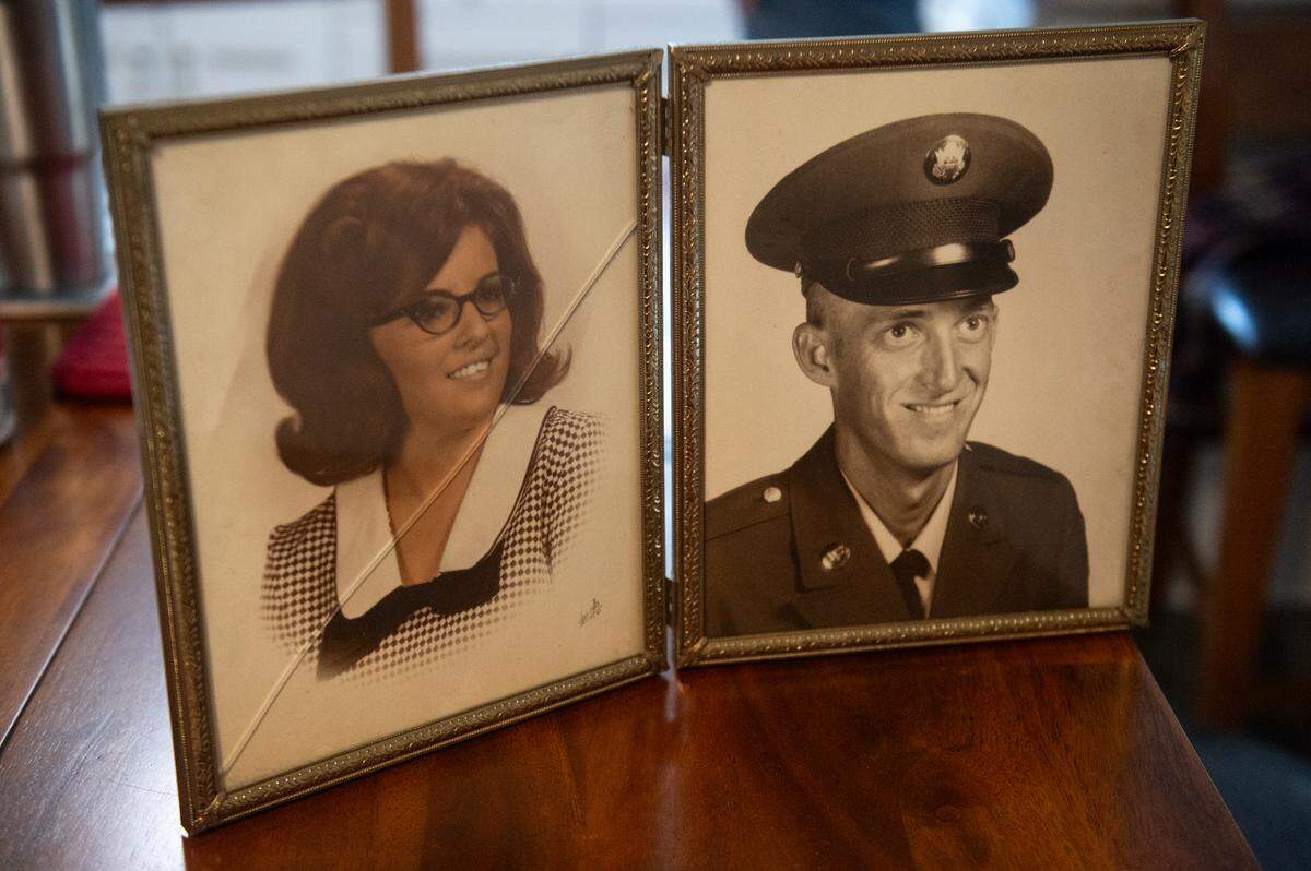 Portaits of Daniel “Danny” Chauvin, also known as the “Honey Do Dude”, and his wife of 53 years Pat sit on a table at his home in Waveland on Thursday, Jan. 25, 2024. The death of Chauvin’s wife in 2022 inspired him to start doing honey do project for women for free, since he no longer had a honey do to things for.