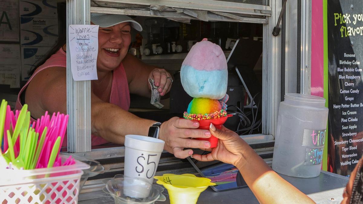 Vendors selling cool treats during the Ocean Springs Cruisin’ the Coast Block Partyon Friday, Oct. 8, 2021.