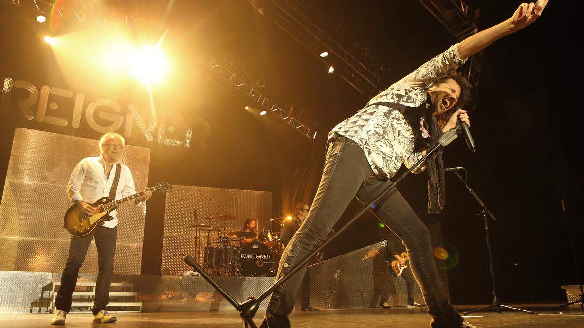 Mick Jones, left, and Kelly Hansen of the band Foreigner perform in concert during the ëSoundtrack of Summer Tour 2014í at the Susquehanna Bank Center on Thursday, July 3, 2014, in Camden, N.J. (Photo by Owen Sweeney/Invision/AP)