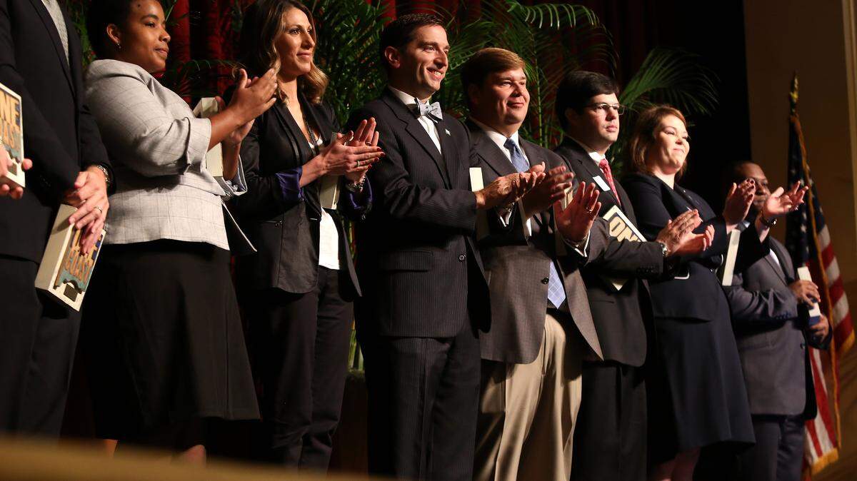 AMANDA McCOY/SUN HERALDWinners of the One Coast Awards' Top 10 Under 40 applaude as the last recipient is named on Tuesday, November 17, 2015, at the Beau Rivage Resort & Casino. The awards ceremony, which also included the Top Community Leaders awards, was presented by the Mississippi Gulf Coast Chamber of Commerce.