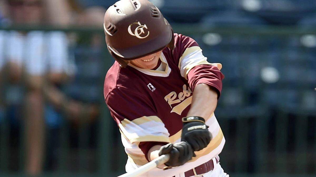 Kyle Whittington tries to get around on an outside pitch on Tuesday, May 19, in the 2015 MHSAA Baseball State Championship at Trustmark Park in Pearl, Miss. On Monday, Whittington helped lead the Rebels to a big division win over Ocean Springs.