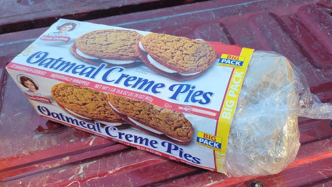 Two people were arrested following a traffic stop when Arkansas police found an Oatmeal Creme Pie box stashed with drugs.