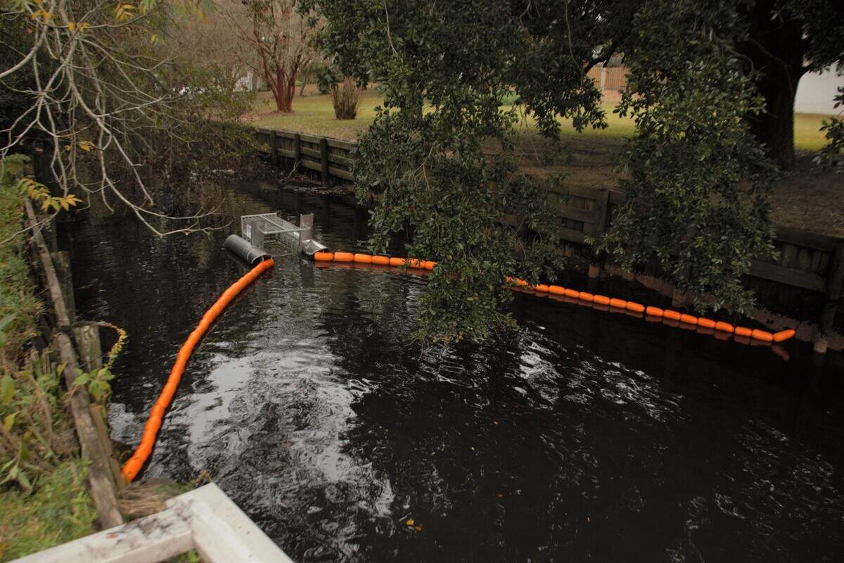 The Litter Gitter, developed by Osprey Initiative of Mobile, Ala., uses booms to direct litter and debris from stormwater runoff and other sources into an aluminum cage. Four Litter Gitters have been deployed in Coast waterways as part of a pilot program aimed at restoration.