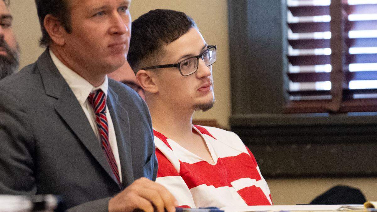Cameron Brand, charged with two counts of murder and four counts of aggravated assault, sits in court with his attorney, Lee Russell, during a motion hearing at Hancock County Circuit Court on Tuesday, Oct. 21, 2025.