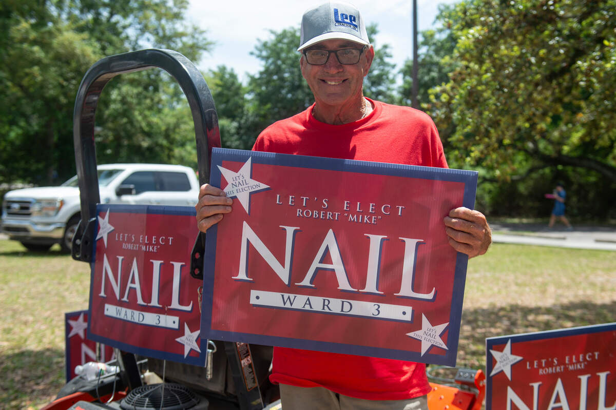 Robert “Mike” Nail, who is running for Biloxi city council, poses outside a polling location at West Biloxi Library during a primary runoff election on Tuesday, April 22, 2025.