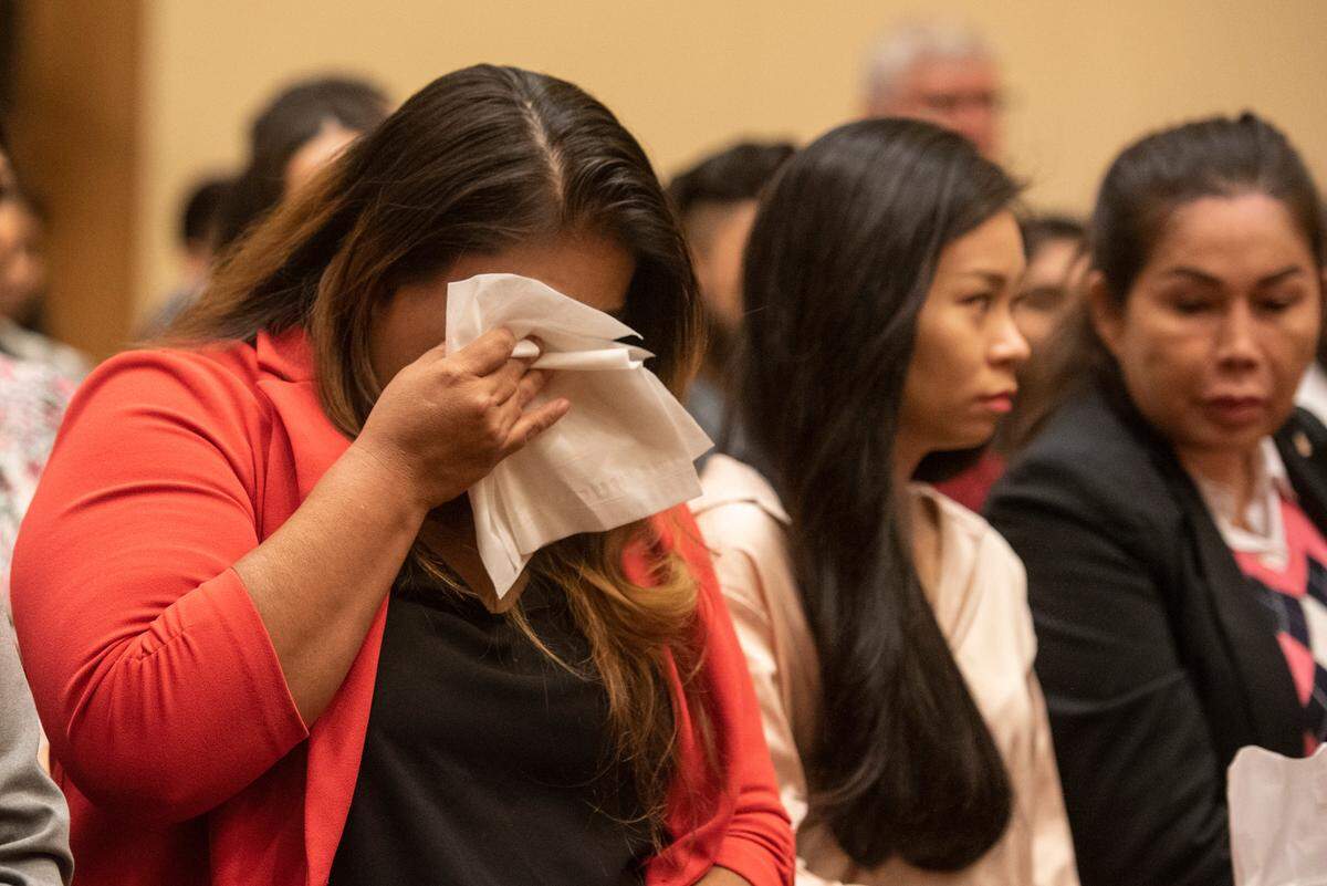 Maria De Lourdes Bailey Juan tears up after becoming an American citizen during a naturalization ceremony at Dan M. Russell Jr. Federal Courthouse in Gulfport on Friday, Oct. 7, 2022.