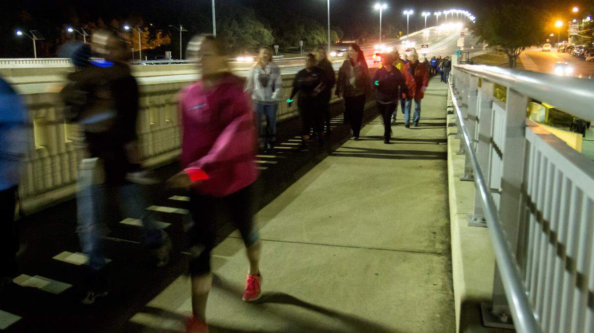 AMANDA McCOY/SUN HERALD 
 Community members participate in a bridge walk of solidarity after a woman reported she was raped on the Biloxi-Ocean Springs bridge in 2014.