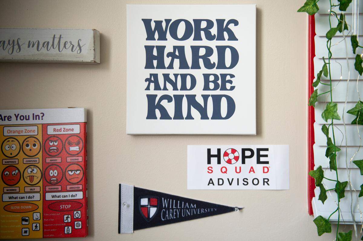 Signs promoting kindness and the Hope Squad in counselor TaLaceia Lamb’s office at Colmer Middle School in Pascagoula on Friday, Aug. 9, 2024. Lamb and other employees in Jackson County school districts have been trained to oversee Hope Squad, a teen suicide prevention initiative that is enlisting middle and high school students to help struggling peers.