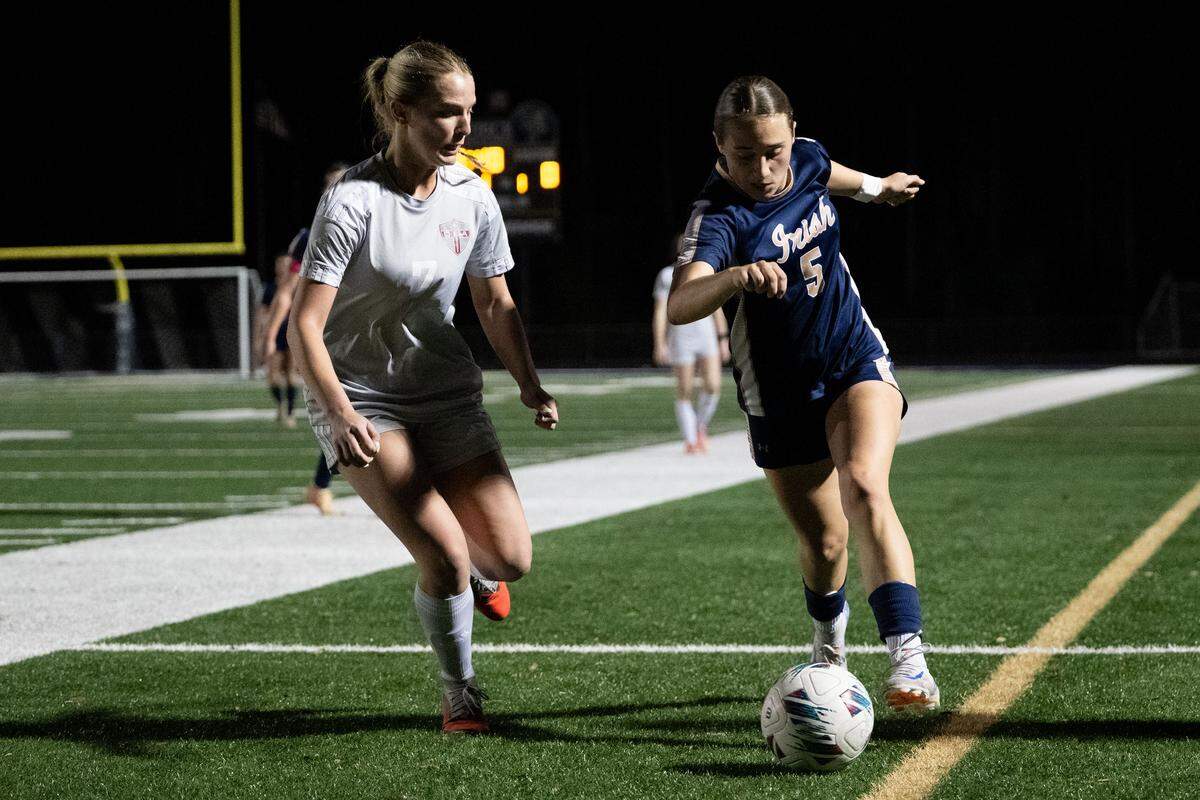 St. Patrick’s Gianna Encrapera (5) dribbles the ball down the sideline during a soccer game at St. Patrick Catholic High School on Tuesday, Feb. 17, 2026