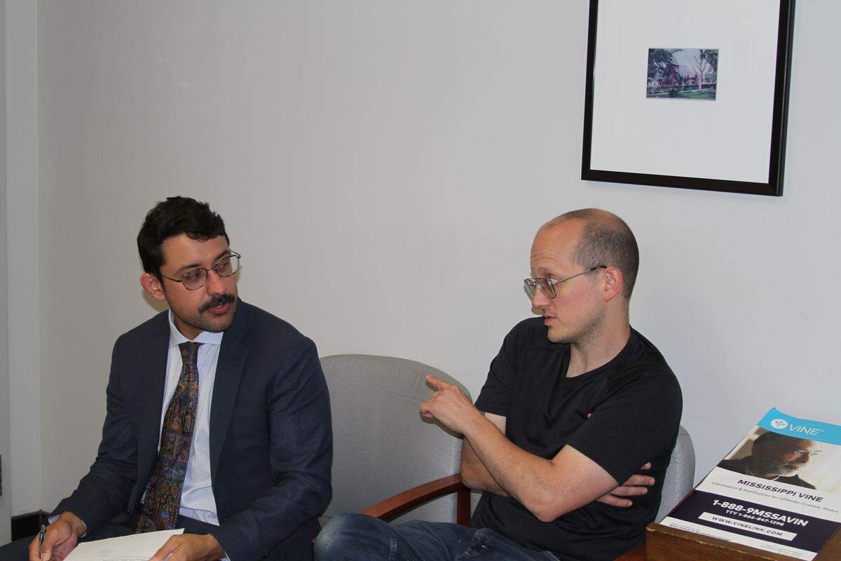 Hattiesburg attorney Arman Fusco, left, talks with client Jarrod Fusco of Biloxi while they wait for copies of a Biloxi Municipal Court file that contains paperwork on misdemeanor charges against Fusco. They got their copies, but the file is sealed, so it can’t be shared.
