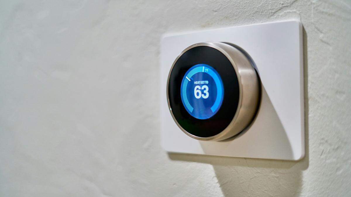 Setting your thermostat a few degrees lower during the winter can help cut energy costs during the winter, according to officials.
