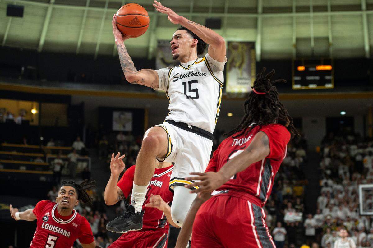Southern Miss’s Donovan Ivory goes for a layup during a game against Louisiana-Lafayette at Reed Green Coliseum on Thursday, Feb. 9, 2023.