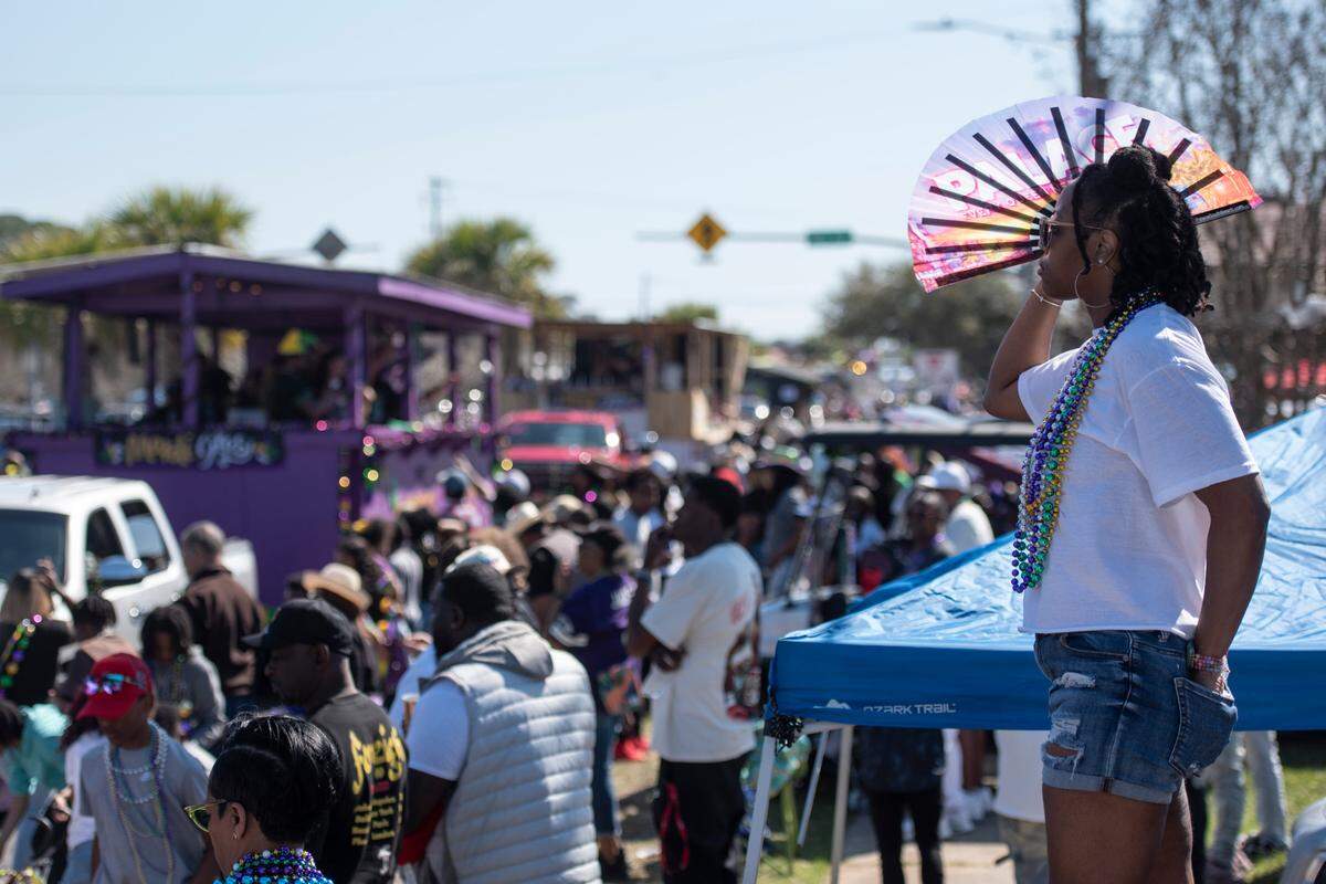 The Jackson County Carnival Association Mardi Gras parade makes its way along Market Street in Pascagoula on Saturday, March 1, 2025.