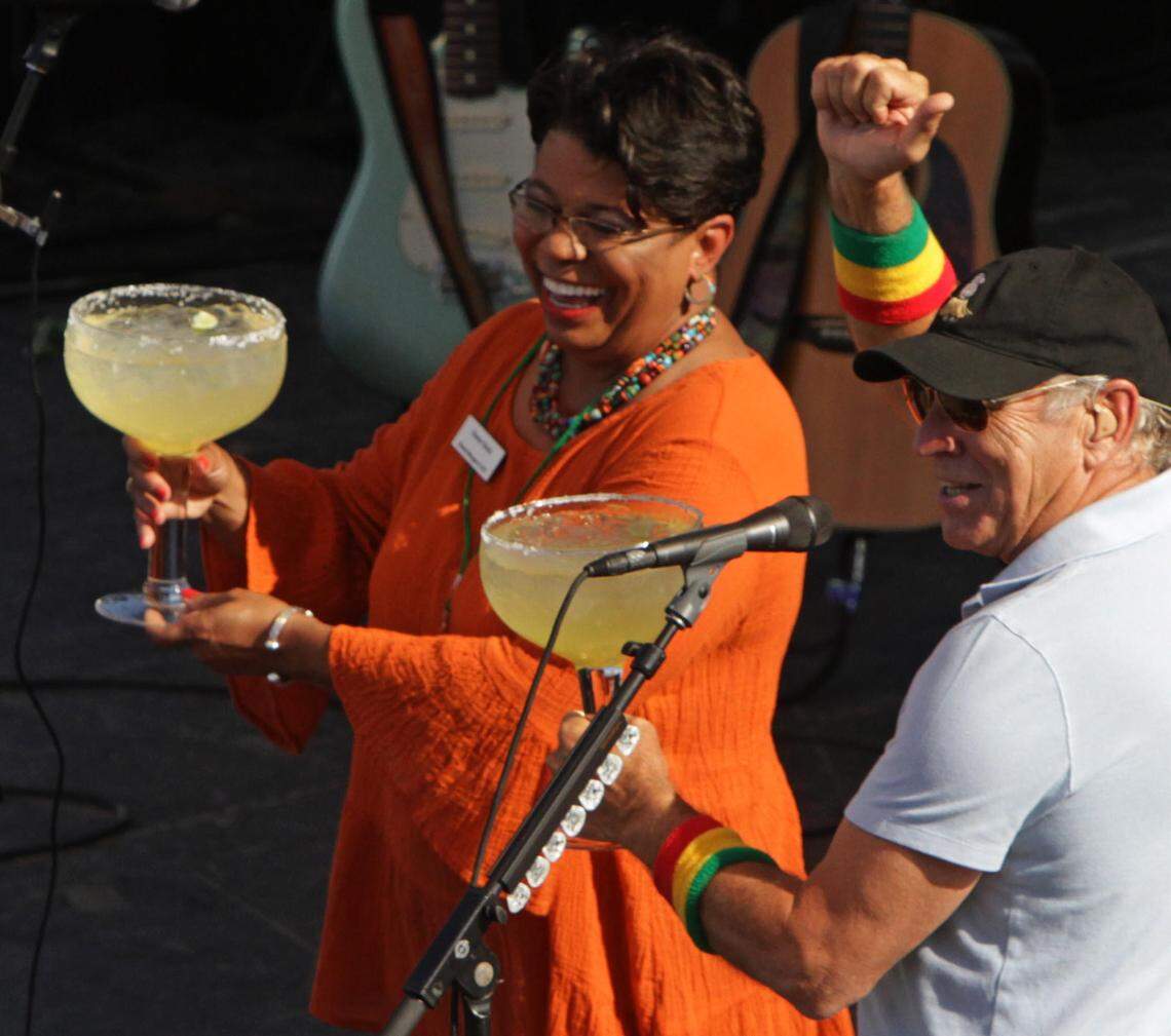 Jimmy Buffett and general manager Karen Sock toast the grand opening of Margaritaville Casino and Restaurant in Biloxi on Tuesday May 22, 2012.