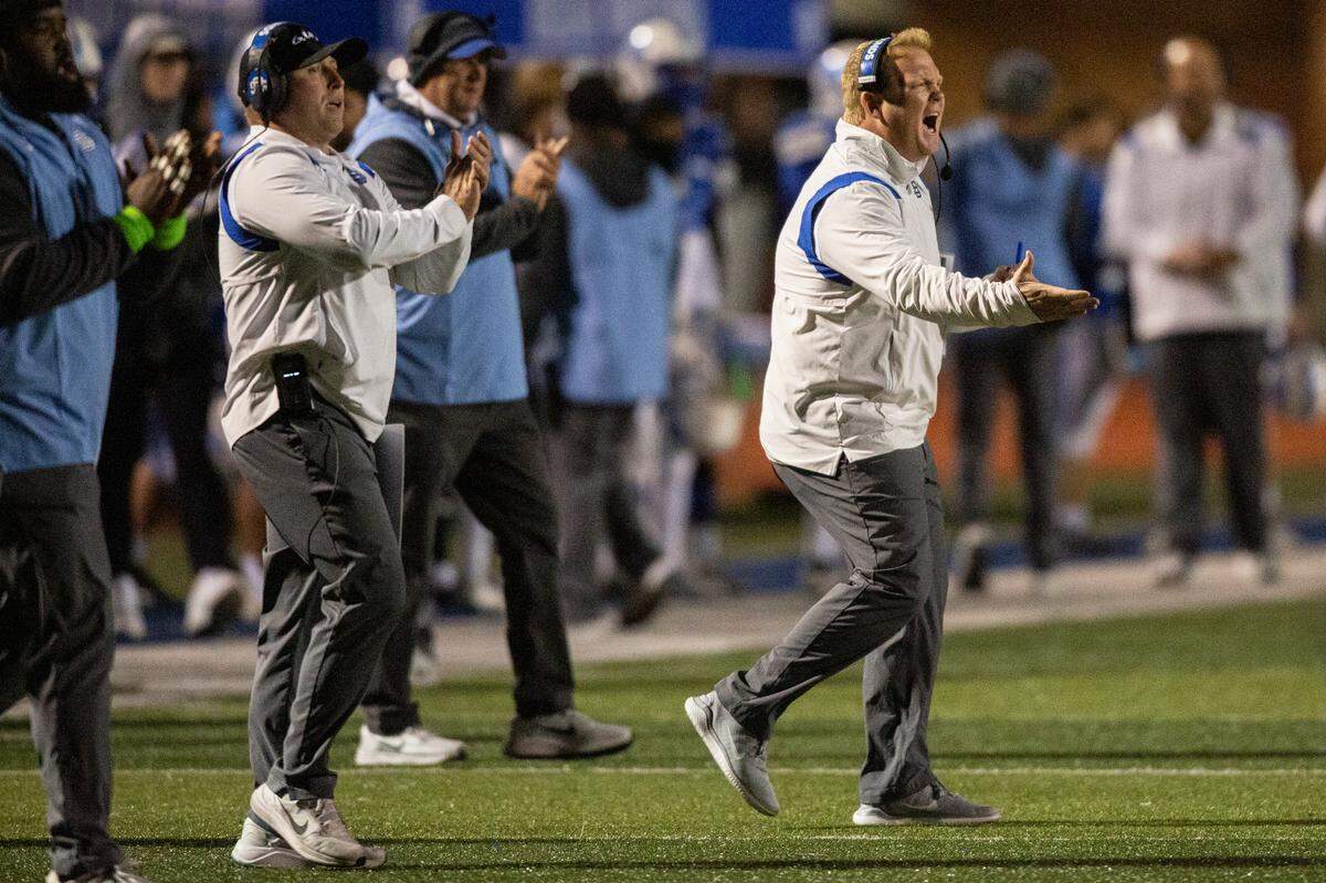 Ocean Springs’ Head Coach Blake Pennock yells at his players during a 6A playoff game at Greyhound Stadium in Ocean Springs on Friday, Nov. 18, 2022.