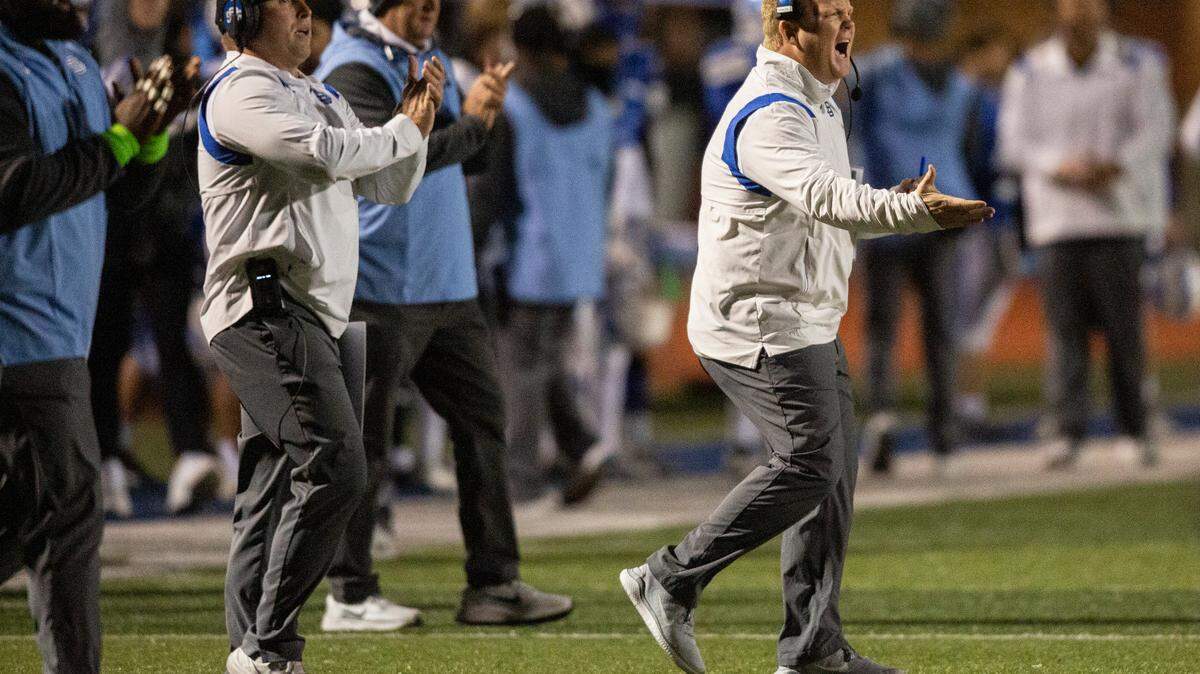 Ocean Springs’ Head Coach Blake Pennock yells at his players during a 6A playoff game at Greyhound Stadium in Ocean Springs on Friday, Nov. 18, 2022.