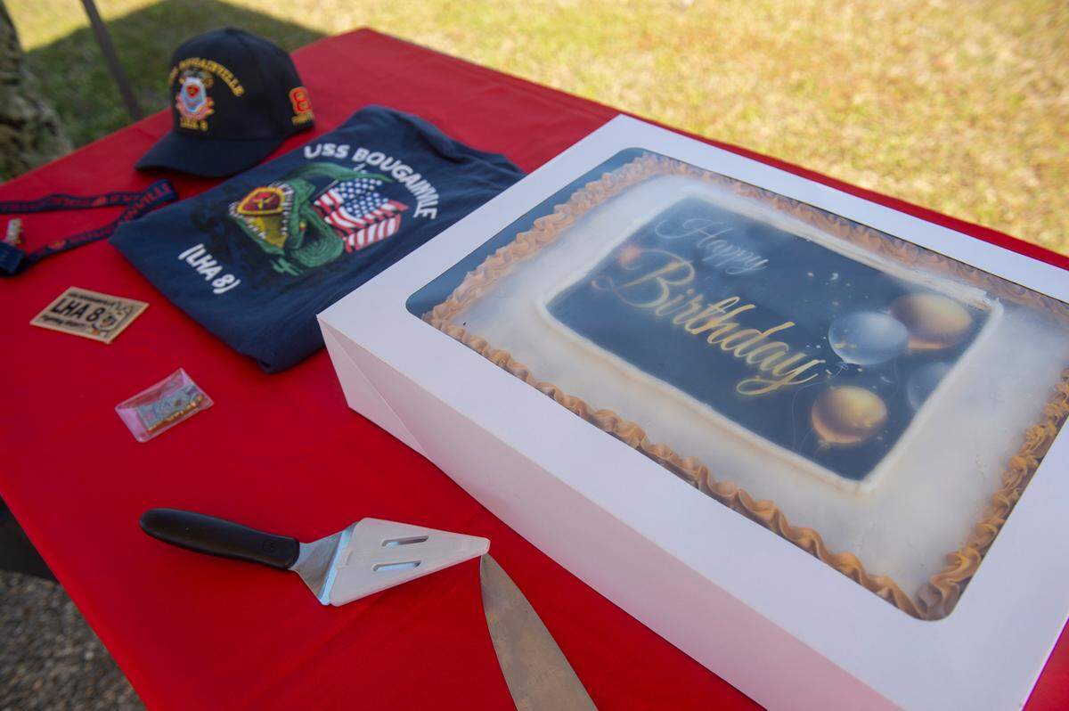 A birthday cake and gifts from the crew of the USS Bougainville for Alfred Lewis at Singing River Island in Pascagoula on Saturday, March 22, 2025.