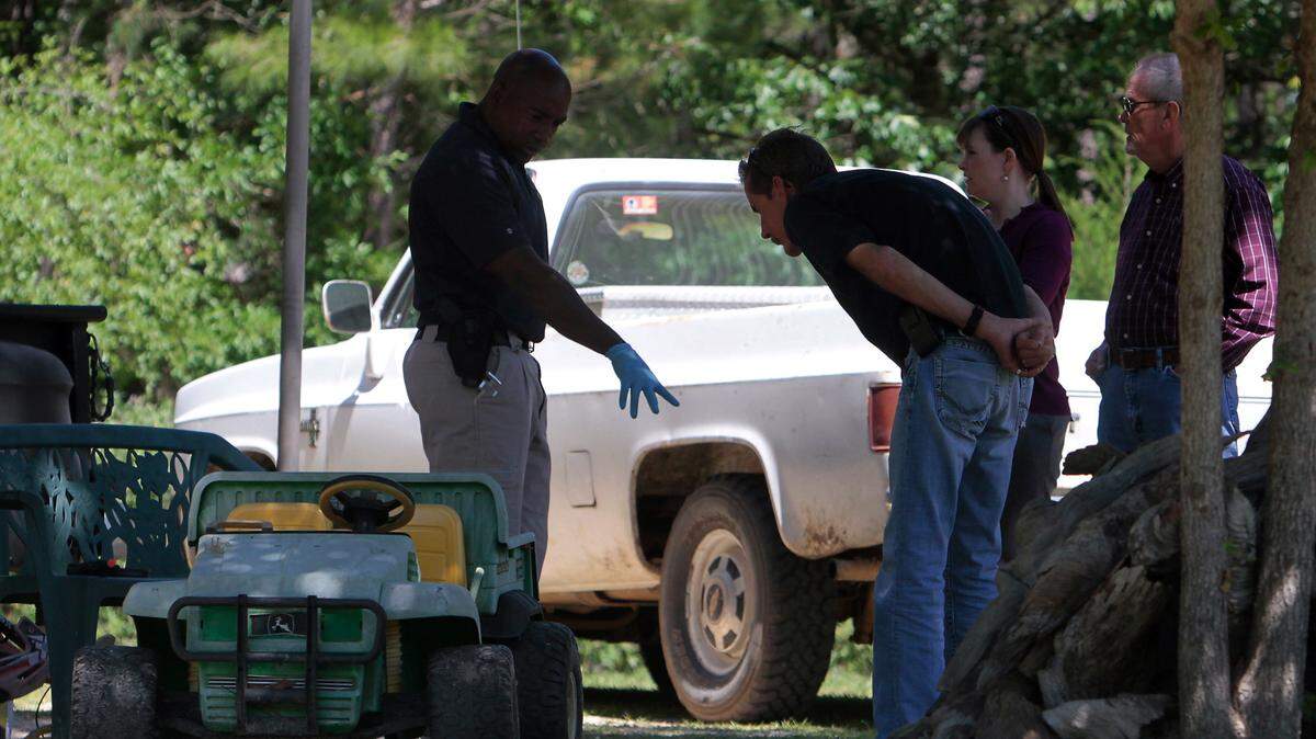 AMANDA McCOY/SUN HERALD 2012Harrison County officials investigate a triple homicide in Saucier in April 2012, after Marty Saucier shot to death his father, mother and brother at the family's home. Kenny Saucier was 62. Kay Saucier was 54. Matt Saucier was 29. Marty Saucier, now 46, is serving three life terms for murder. Relatives have said his father had kicked him out of the house.