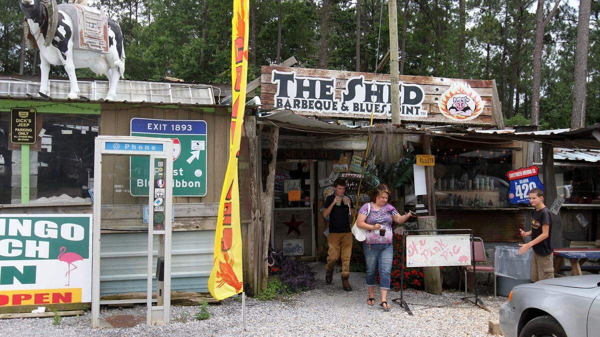 JOHN FITZHUGH/SUN HERALD 
 Guests leave The Shed Barbecue & Blues Joint on Mississippi 57 near Vancleave on Tuesday June 14, 2016. The Jackson County building department has sighted The Shed for several violations.