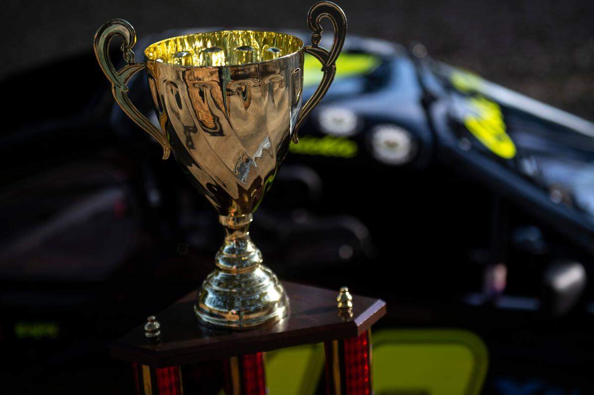 Cole Denton’s second place trophy from the INEX Bandit Eastern Division beside his car at Pascagoula Beach Park in Pascagoula on Thursday, March 10, 2022.