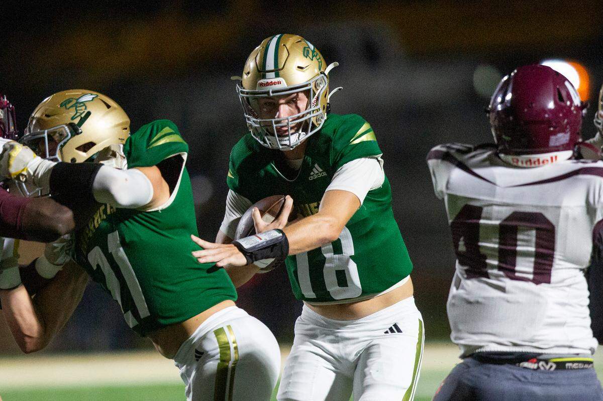 Poplarville quarterback Sydney Blackmon runs the ball up the field during a playoff game against Forrest County Agricultural High School at Poplarville High School in Poplarville on Friday, Nov. 10, 2023.