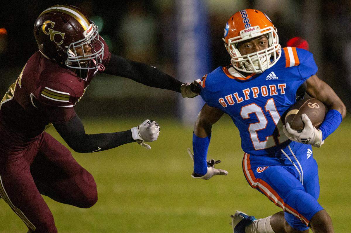 Gulfport’s Zion Barney evades tackle during a game against George County at Milner Stadium in Gulfport on Friday, Aug. 26, 2022.