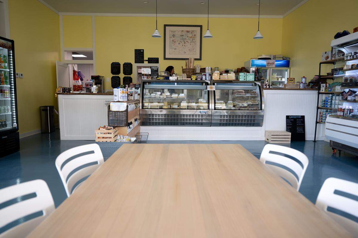 A seating and dining area at St. James Cheese Company in Pass Christian.