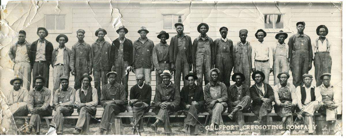 Workers are pictured in 1940 at Gulfport Creosoting Co. on Creosote Road. Cavenham Forest Industries closed the plant in 1987 and cleanup was ordered by the Environmental Protection Agency because of toxic chemicals remaining on the land.