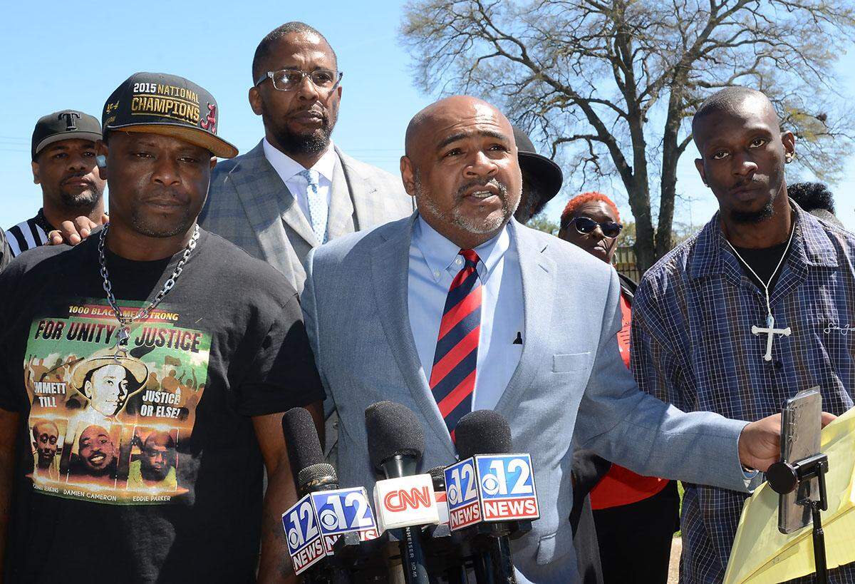 From left, Eddie Parker; Malik Shabazz, a lawyer; Trent Walker, a lawyer; and Michael Jenkins during a news conference in Jackson last year.