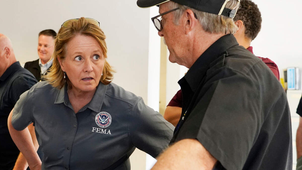 Deanne Criswell, administrator of the Federal Emergency Management Agency (FEMA), left, confers with Jim Craig of the Mississippi State Health Department, during a visit to the City of Jackson’s O.B. Curtis Water Treatment Facility in Ridgeland, Miss., Friday, Sept. 2, 2022. Jackson’s water system partially failed following flooding and heavy rainfall that exacerbated longstanding problems in one of two water-treatment plants. (AP Photo/Rogelio V. Solis, POOL)