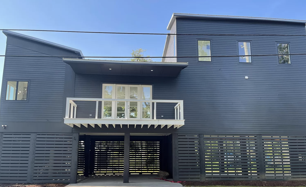 A “modern beach cottage” is for sale in Pass Christian, Mississippi.