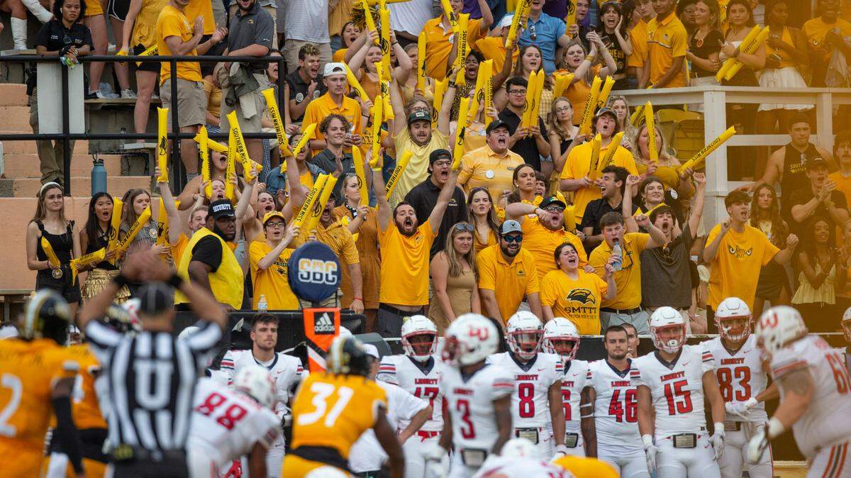 Southern Mississippi fans cheer during a NCAA college football game against Liberty in Hattiesburg, Miss., Saturday, Sept. 3, 2022. Southern Mississippi lost 29-27