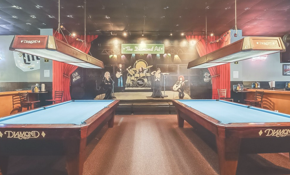A dramatic layout of billiard tables may be what attracts a buyer to this restaurant and pool hall near the beach in Gulfport.