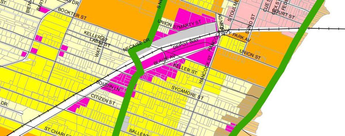 The zoning map for Ward 3 in Bay St. Louis shows commercial areas (in pink) near the train depot and in limited areas near Sycamore Street.