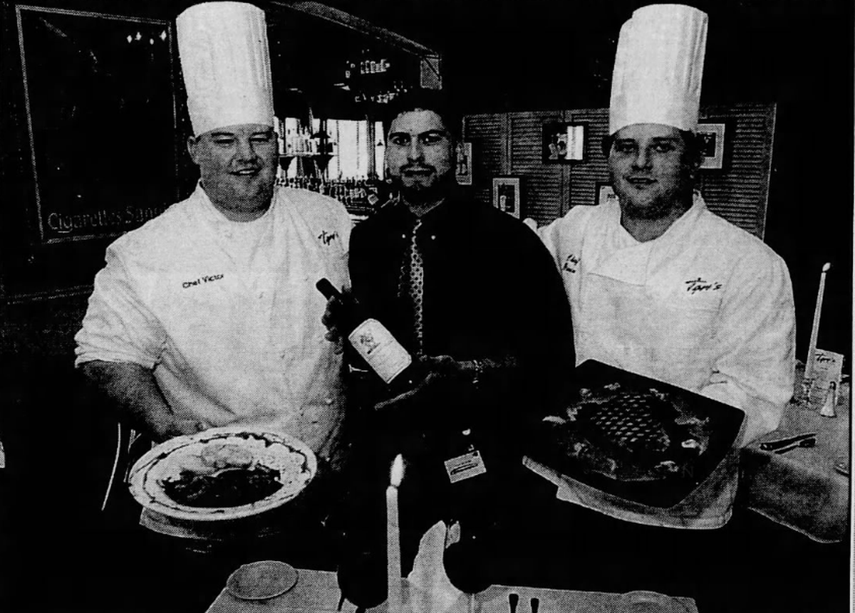 Tigre’s owners Victor Pickich, left, and Thomas Genin (right) at their new Pass Christian restaurant, as seen in the Sun Herald on April 18, 2002.