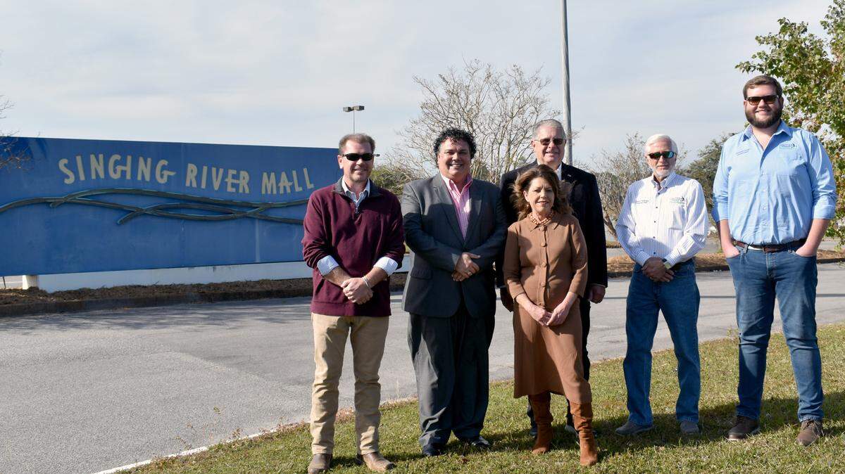 Photographed on the former Singing River Mall property, from left, are Gautier Councilman at Large Adam Colledge, Mayor Casey Vaughan, City Manager Paula Yancey, Councilman Gordon Gollott, Councilman Rusty Anderson, and Councilman Cameron George.