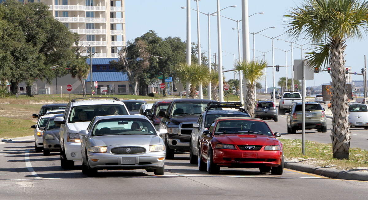 Traffic at U. S. 90 and DeBuys Road waits for the light to change in this Sun Herald file photo. The former Olive Garden location at this intersection is an ideal place for a convenience store and gas station, a developer says.