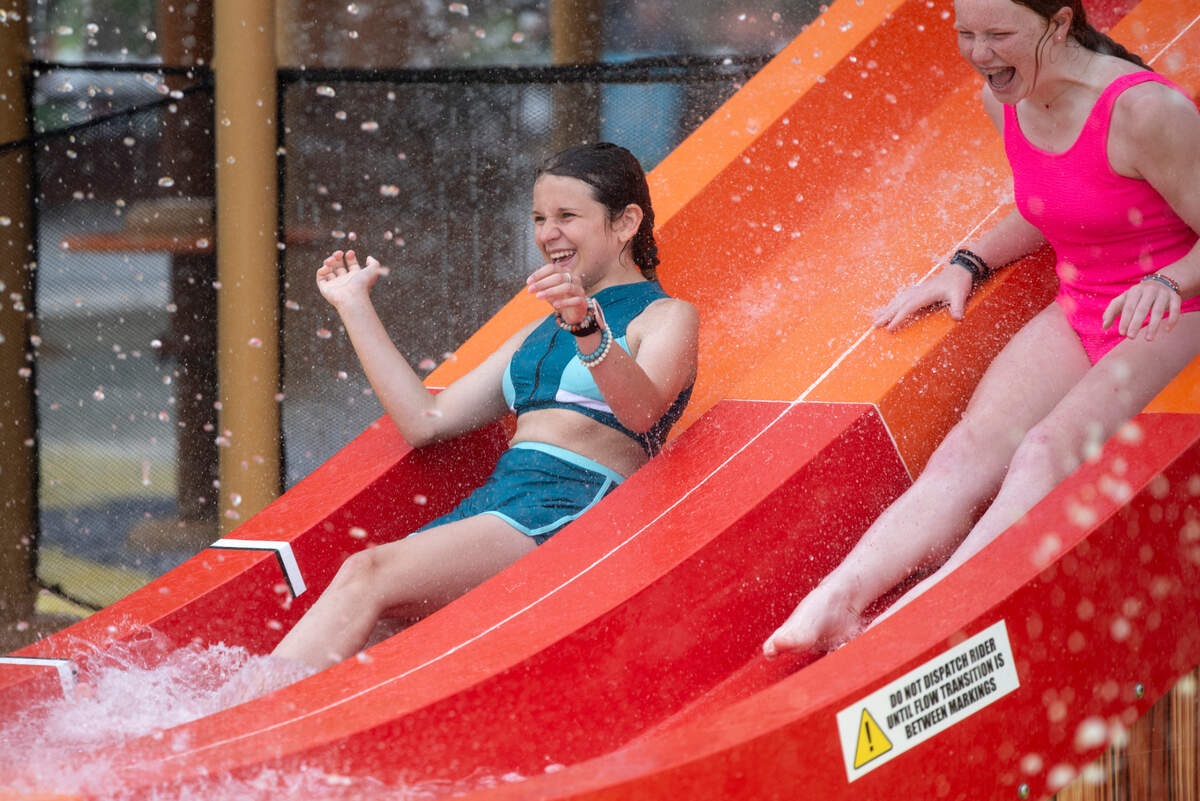 Kids slide down some of the Little Tikes slides at Serengeti Springs at the Hattiesburg Zoo, a new waterpark that opened in May, on Wednesday, June 5, 2024.