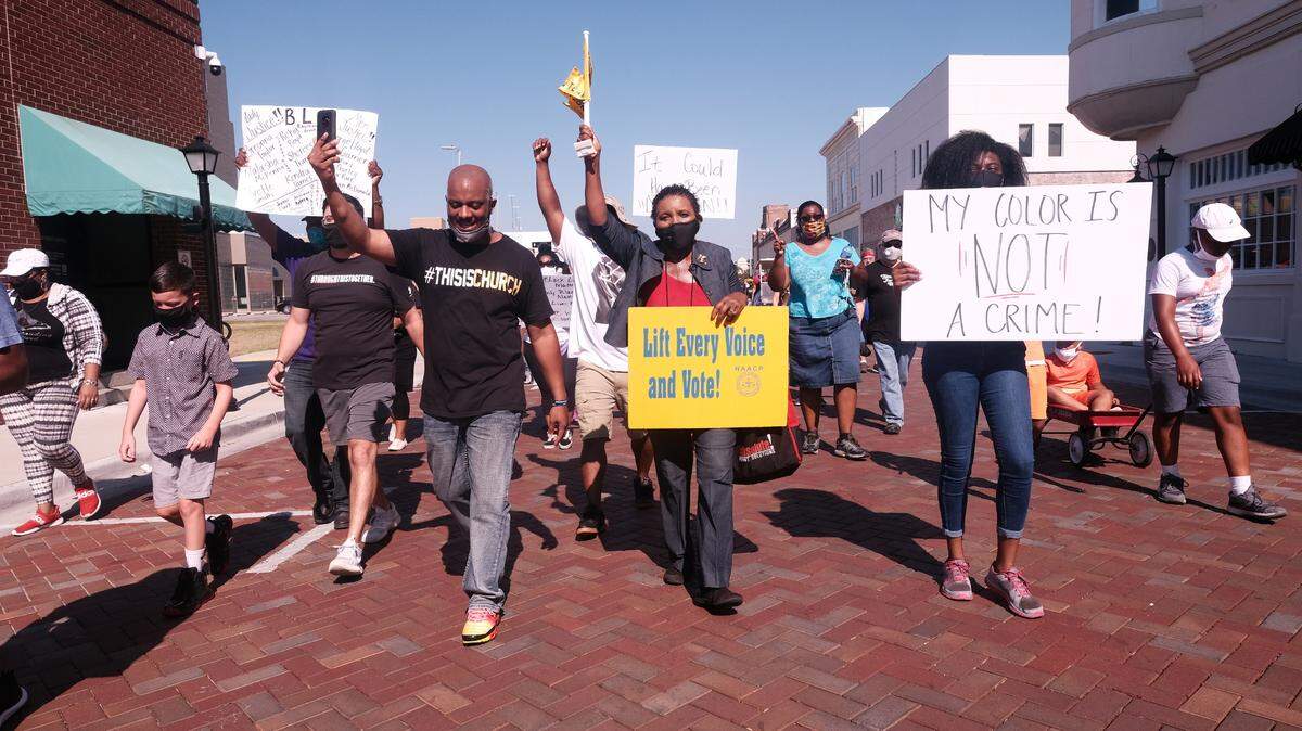 Minister Greg Whitfield leads the Unity March in Biloxi Saturday, June 20, 2020. The march kicked off a day of events celebrating Juneteenth in South Mississippi.